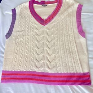 Super cute color block sweater vest w/ cable knit front; size medium; worn once